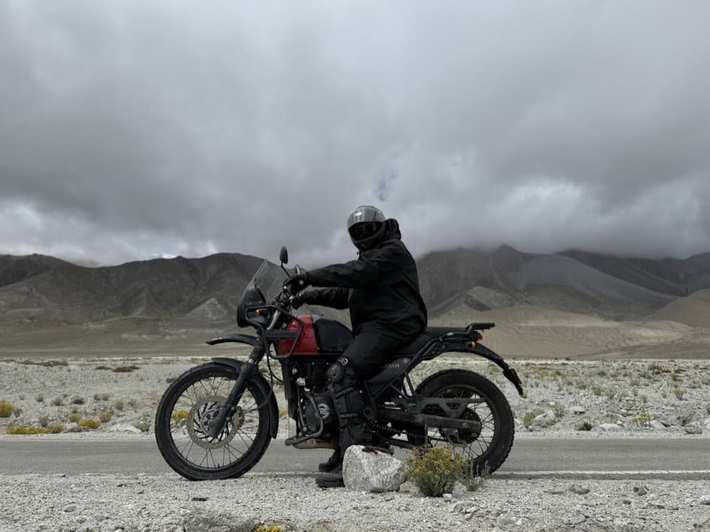 Solo rider against mountain backdrop